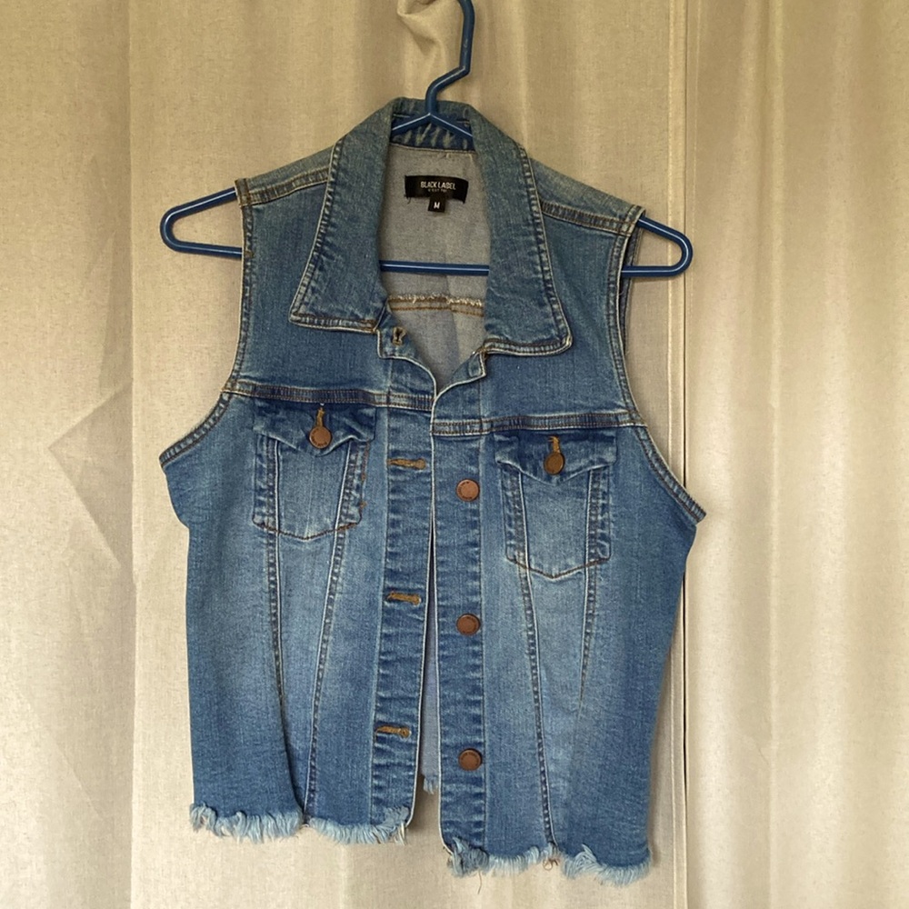 Adorable fringed denim vest. Great condition. Barely worn. No visible flaws.